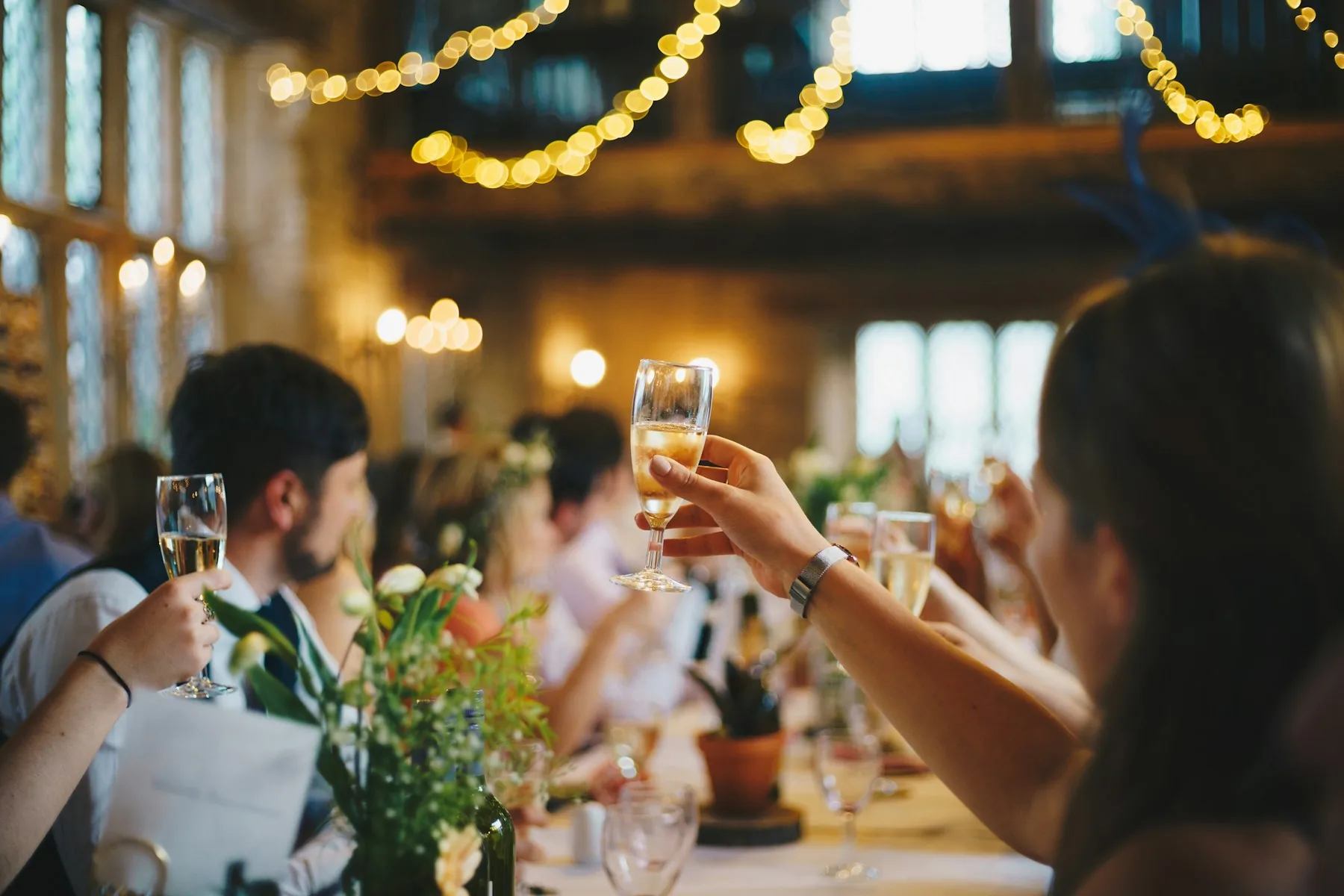 friends celebrating at an event with photos auto-collected by Picaggo